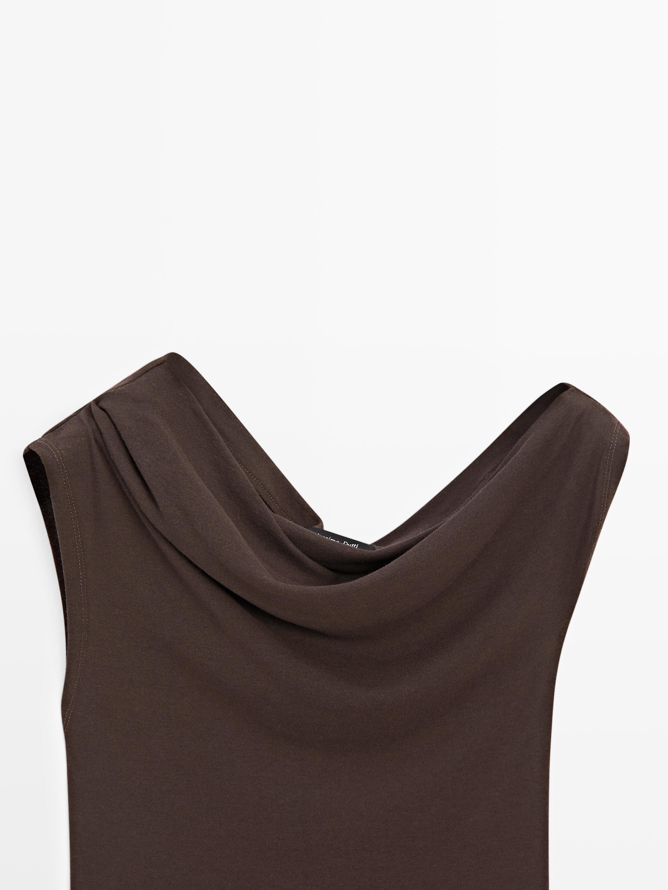 Sleeveless asymmetric top